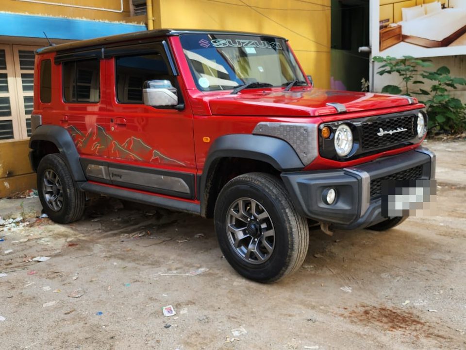 Maruti Suzuki Jimny — Red self-drive car in Bengaluru
