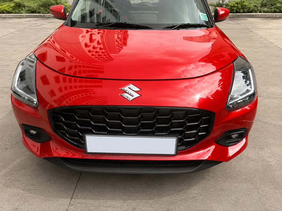 Maruti Suzuki Swift — Red self-drive car in Bengaluru